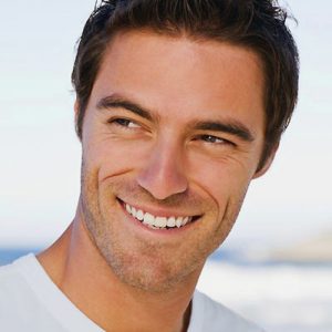 Man with veneers with the natural and perfect smile